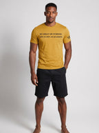 Unisex gold edition T-shirt by CIM Designs with "Be Great On Purpose" slogan on front, casual fit and soft fabric.